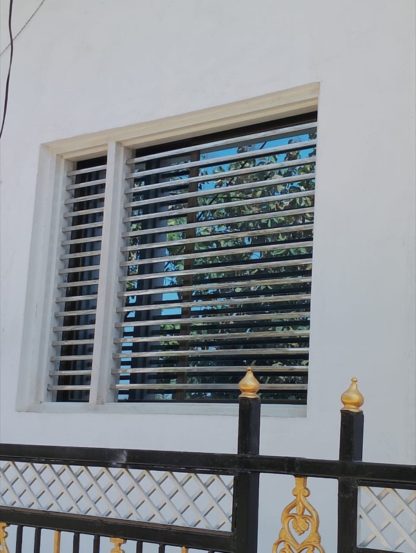 PPGI steel louvered window installation by Shyam Steel Industries